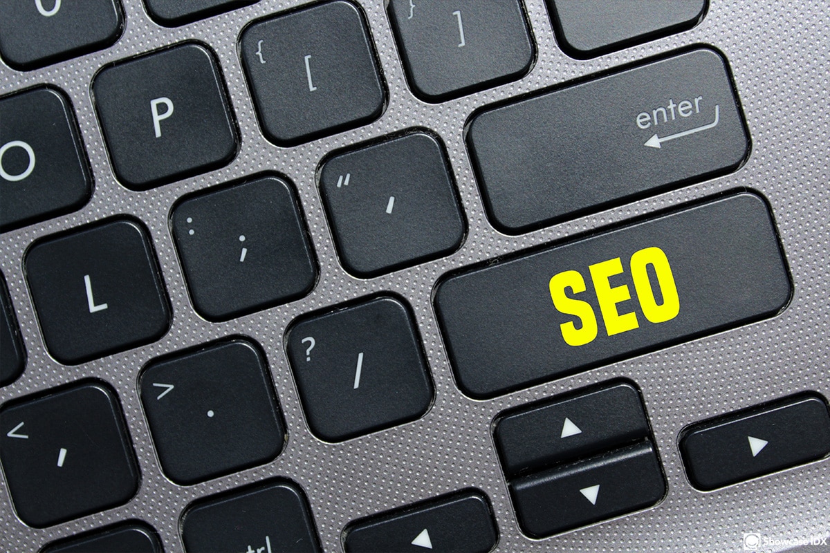 seo for real estate agents - seo button on laptop